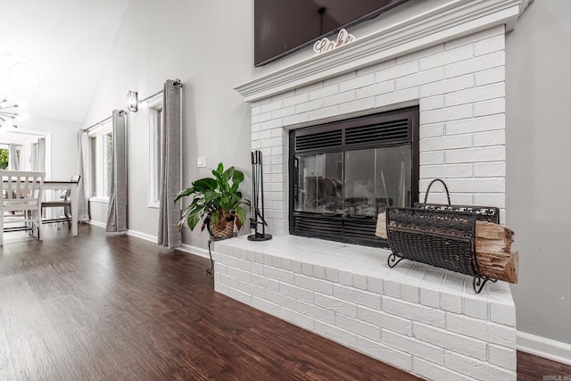 details with a fireplace and wood-type flooring