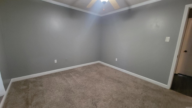 unfurnished room with ornamental molding, carpet flooring, and ceiling fan