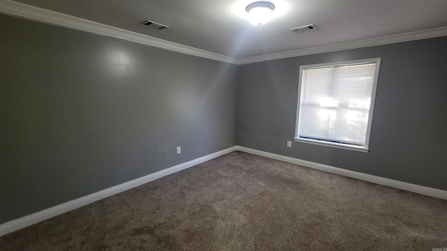 carpeted empty room featuring ornamental molding