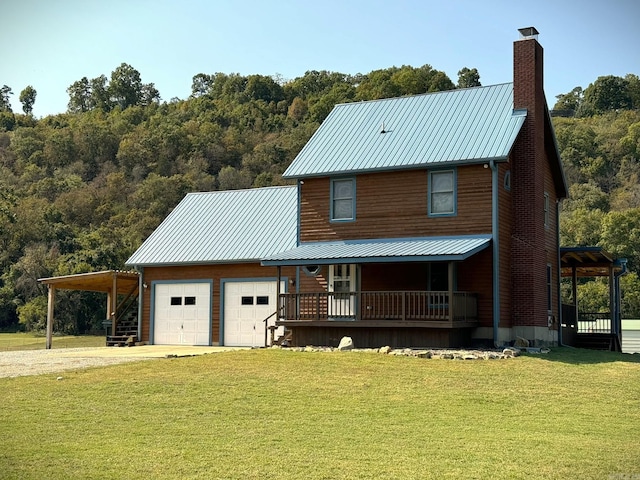 view of front of home with a front yard, an attached garage, covered porch, a chimney, and dirt driveway