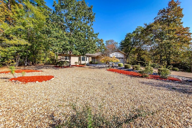 view of yard featuring a garage