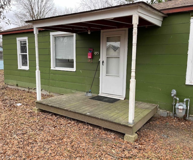 doorway to property with a deck