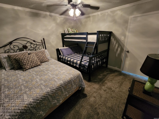 carpeted bedroom featuring ceiling fan and crown molding