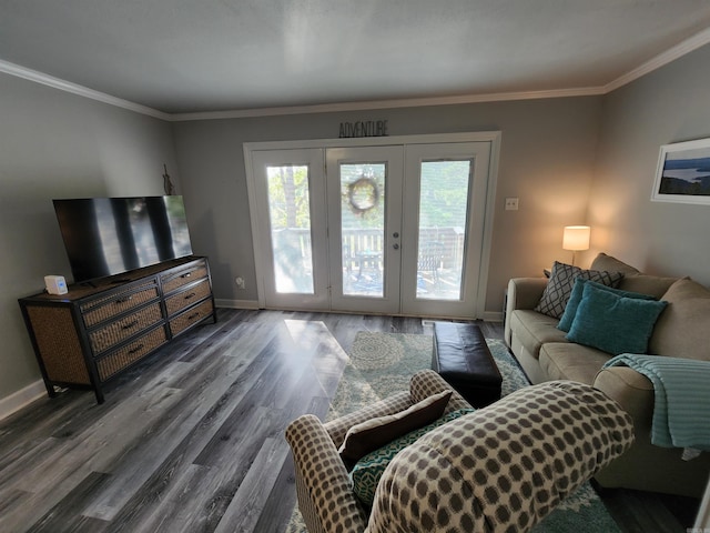 living room featuring ornamental molding, dark wood-type flooring, and french doors