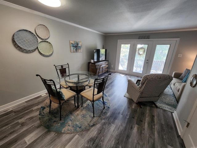 dining area with french doors, dark hardwood / wood-style floors, and ornamental molding