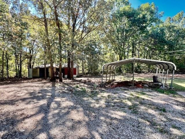 view of yard with a carport