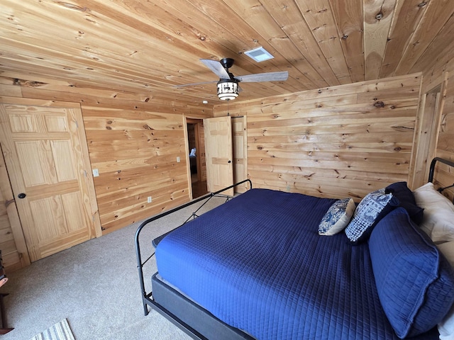 3189 Brownsville Rd, Greers Ferry, AR 72067 - carpeted bedroom with wood walls, wood ceiling, and ceiling fan