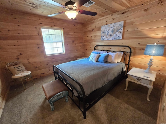 3189 Brownsville Rd, Greers Ferry, AR 72067 - carpeted bedroom with wood walls, wooden ceiling, and ceiling fan