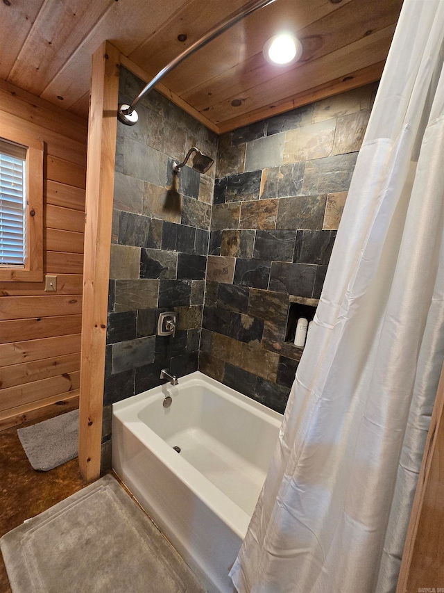 bathroom with wood walls, shower / tub combo, and wooden ceiling