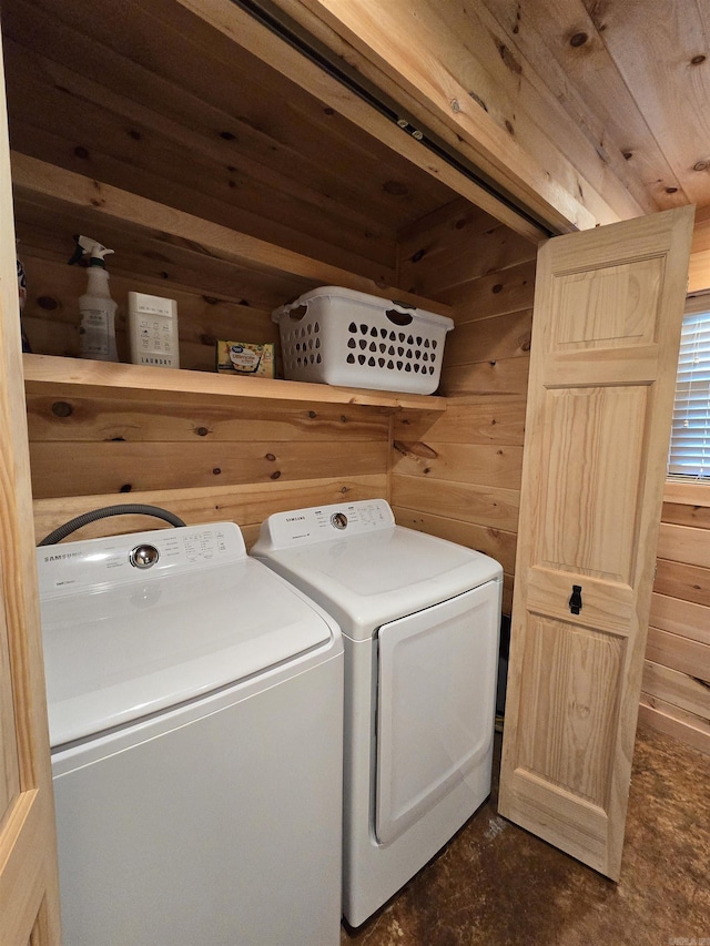 3189 Brownsville Rd, Greers Ferry, AR 72067 - washroom featuring wood walls, washer and clothes dryer, and wooden ceiling