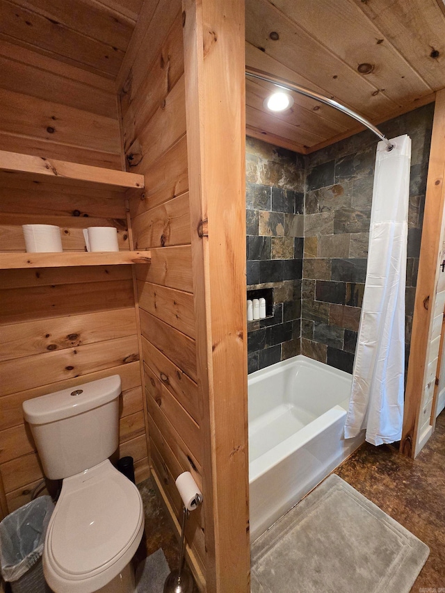 bathroom with wood walls, toilet, and shower / tub combo