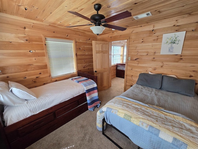 3189 Brownsville Rd, Greers Ferry, AR 72067 - bedroom featuring carpet, wooden walls, wood ceiling, and a ceiling fan