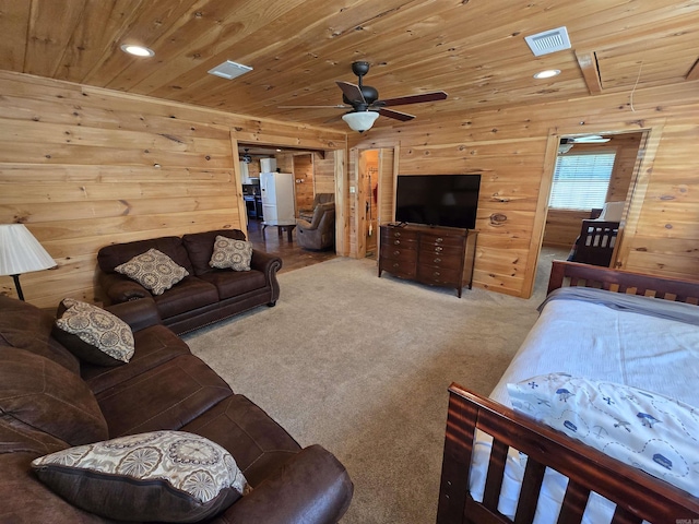 3189 Brownsville Rd, Greers Ferry, AR 72067 - living room featuring wooden walls, wooden ceiling, a ceiling fan, carpet floors, and recessed lighting