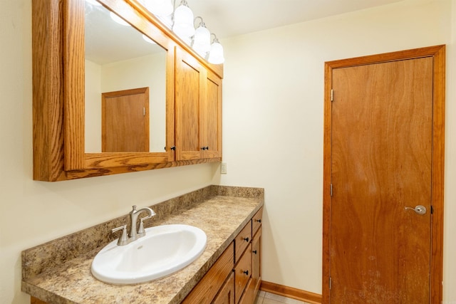 bathroom featuring tile patterned floors and vanity