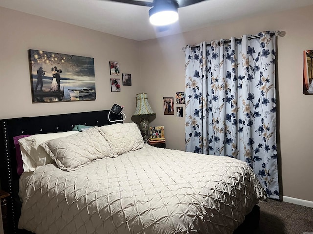 bedroom featuring ceiling fan and carpet floors