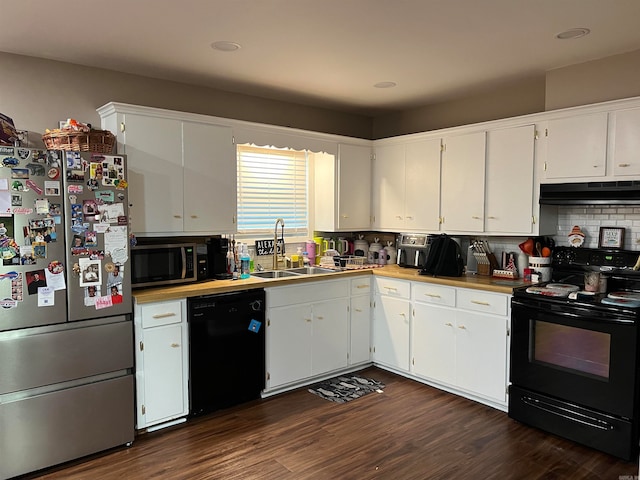 kitchen featuring black appliances, decorative backsplash, dark wood-type flooring, sink, and white cabinetry