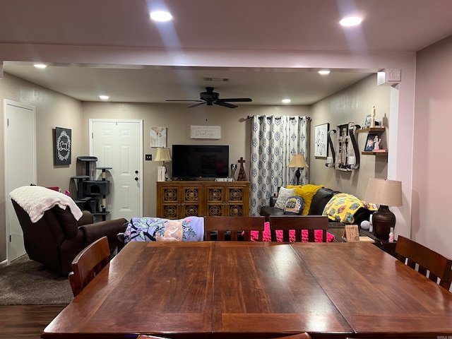 dining room featuring dark wood-type flooring and ceiling fan