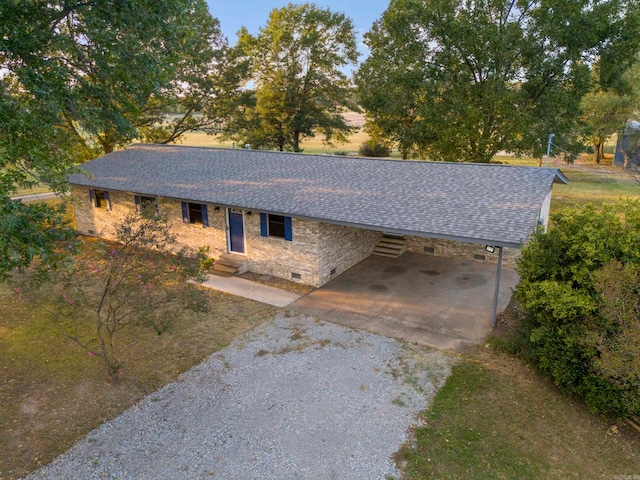 view of front of home featuring a carport