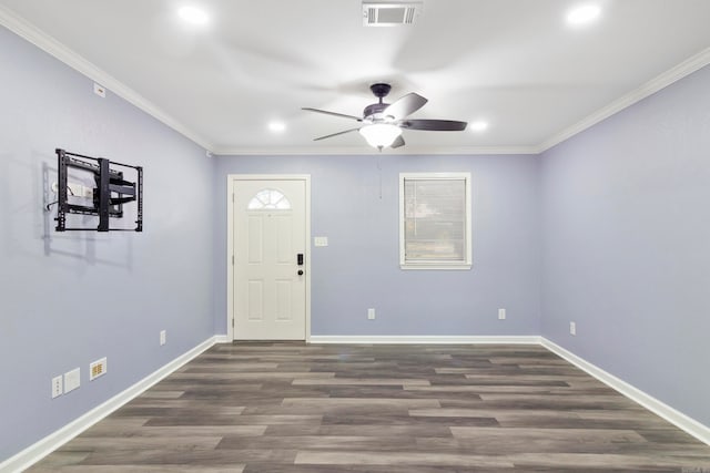 entryway featuring ornamental molding, ceiling fan, and dark hardwood / wood-style flooring