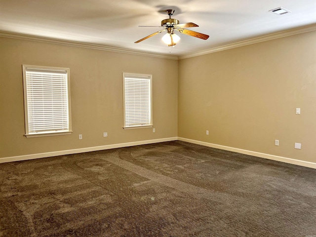 carpeted spare room with crown molding and ceiling fan