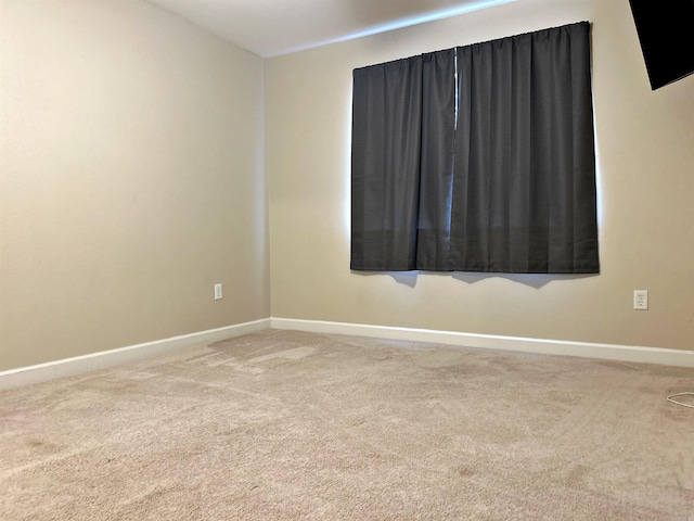 view of carpeted spare room