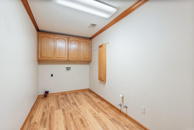 laundry room with ornamental molding, hookup for an electric dryer, light hardwood / wood-style flooring, hookup for a gas dryer, and hookup for a washing machine