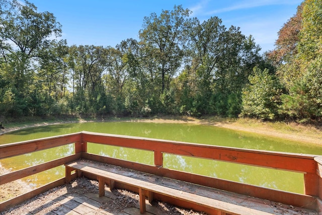 wooden terrace with a water view