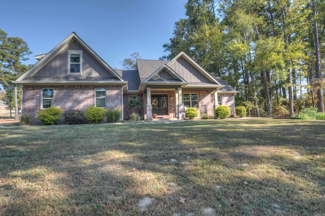 craftsman-style home with a front yard