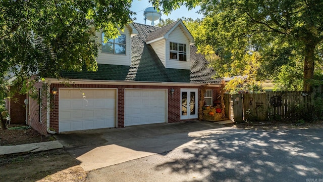 view of front of property with a garage