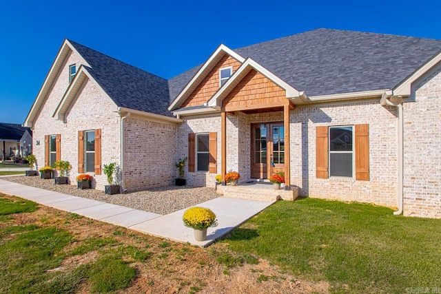 view of front of home with a front lawn