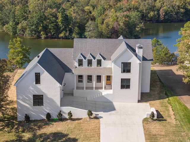 bird's eye view with a water view