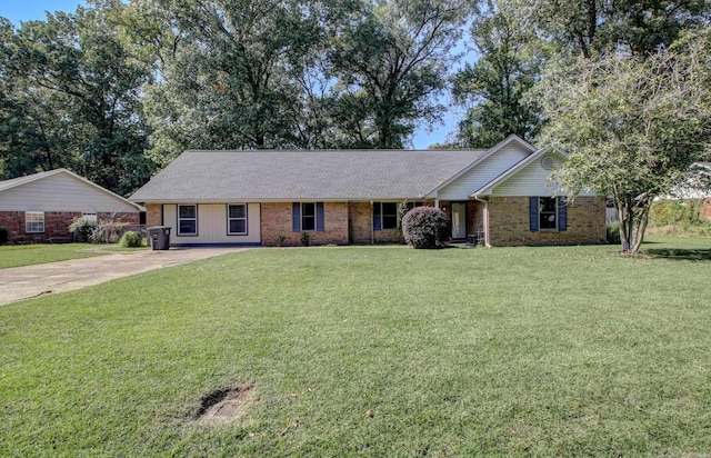 ranch-style house with a front lawn