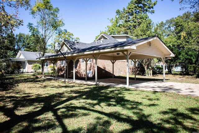 view of parking / parking lot featuring a yard