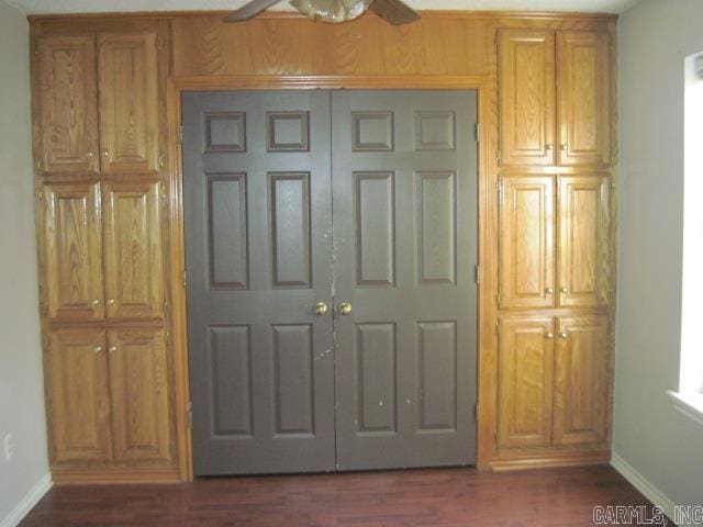 interior details featuring hardwood / wood-style floors