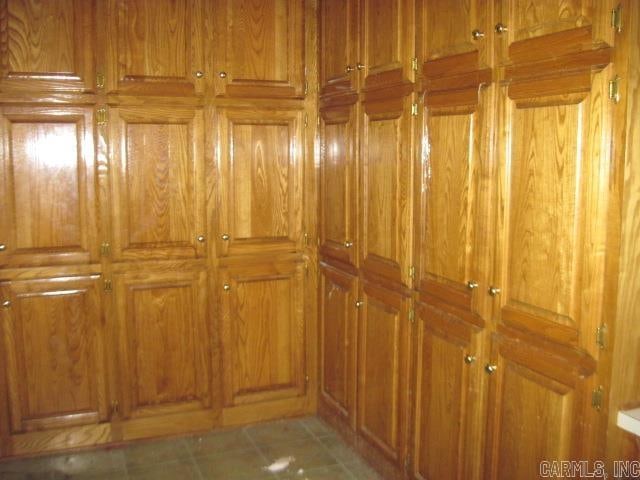 interior details featuring tile patterned flooring