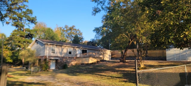 view of yard with a wooden deck