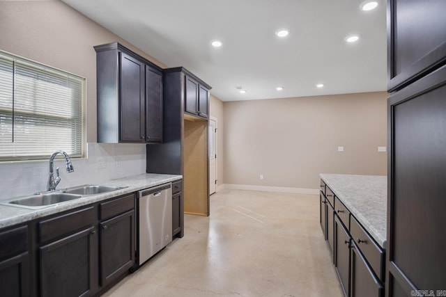 kitchen with sink, dark brown cabinetry, stainless steel dishwasher, and tasteful backsplash