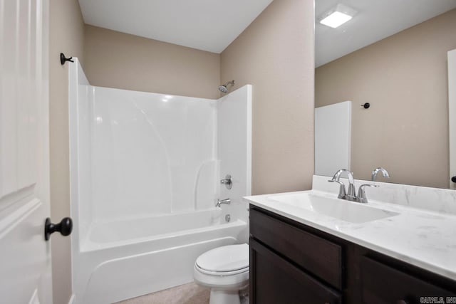 full bathroom with tub / shower combination, vanity, and toilet