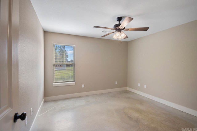 spare room with ceiling fan