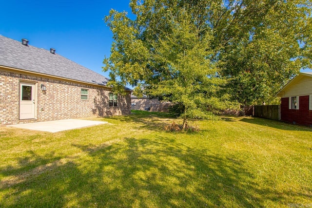 view of yard with a patio area