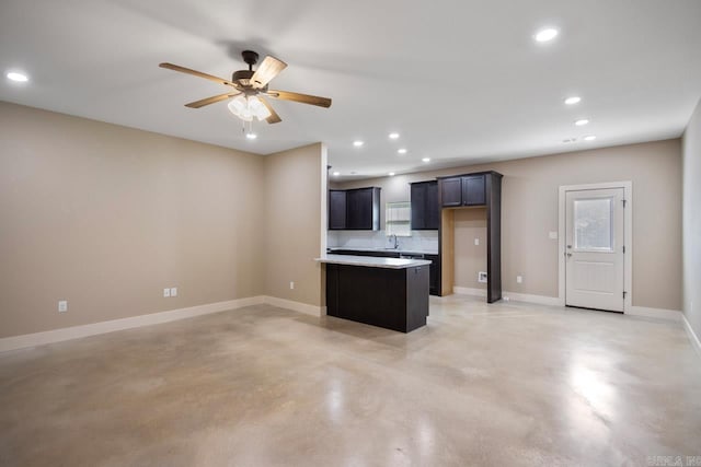 kitchen with ceiling fan and sink