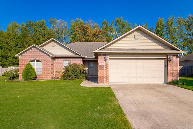 single story home featuring a front yard and a garage