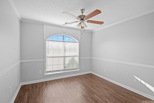 unfurnished room with crown molding, hardwood / wood-style floors, and ceiling fan