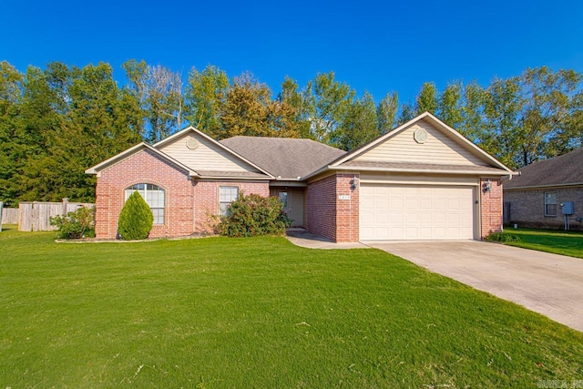 ranch-style home featuring a front yard and a garage