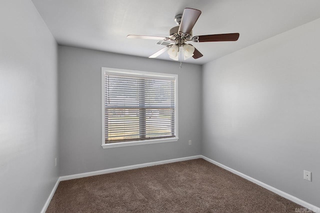 carpeted empty room with ceiling fan