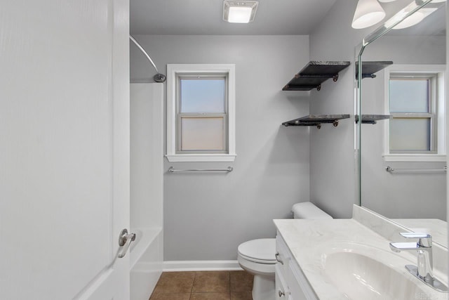 full bathroom with bathtub / shower combination, tile patterned floors, vanity, and toilet