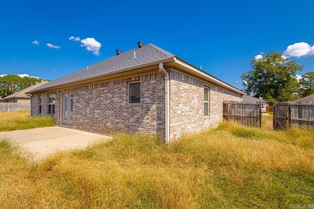 rear view of house featuring a patio area