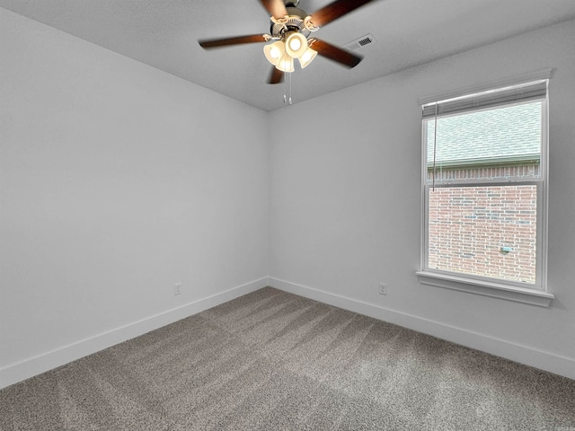 unfurnished room featuring carpet flooring and ceiling fan