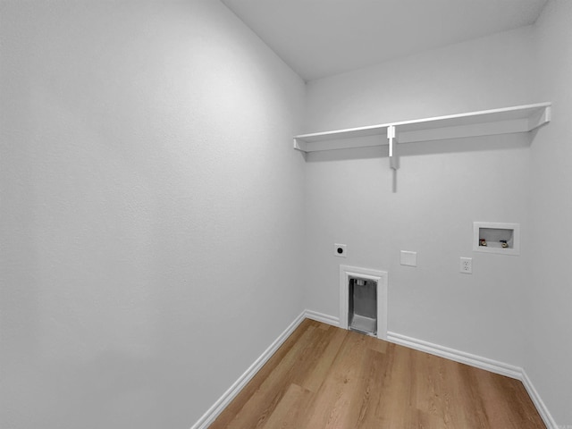 laundry room featuring hookup for an electric dryer, hookup for a washing machine, and wood-type flooring