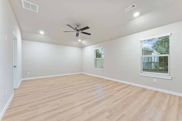 unfurnished room with ceiling fan and light wood-type flooring